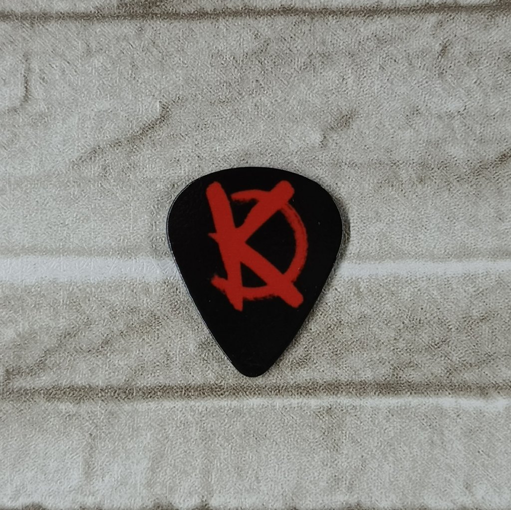 Kaukázus K betűs gitárpengető